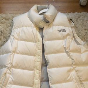 White puffy vest north face